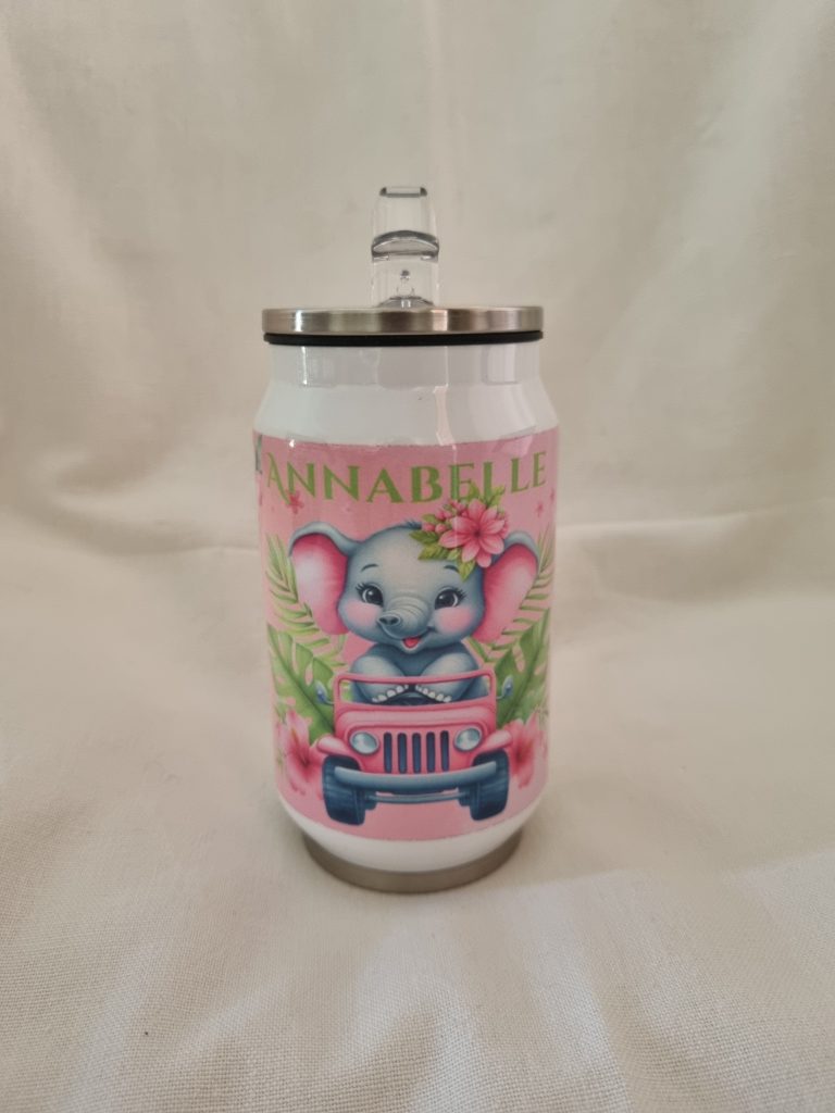 A cute kids’ tumbler with a baby elephant in a pink jeep, tropical leaves, flowers, and the name "Annabelle" printed on it. Features a stainless steel lid with a clear straw.
